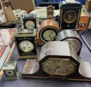 A French brass carriage timepiece together with two black slate mantle clocks and other mantle