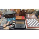 A chess board together with other games, cases, gavels,