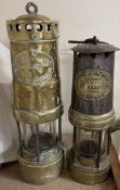 A Thomas and Williams steel and brass miners lamp together with a Thomas and Williams all brass