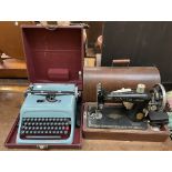 A Singer sewing machine in an ok case together with an Olivetti Studio 44 typewriter cased