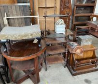 A circular occasional table together with an upholstered foot stool, hanging shelves,