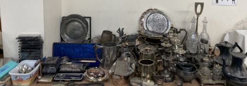 An electroplated three decanter tantalus together with assorted electroplated and pewter wares