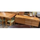 A mid 20th century Avolon dining suite comprising a table,