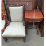 A Victorian nursing chair with a chequer pad upholstery on turned legs together with a Victorian