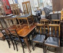 A mahogany extending dining table on cabriole legs together with a set of four ladder back chairs,