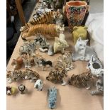 A collection of Russian tigers, a Royal Dux tiger, other tigers,
