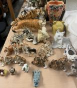 A collection of Russian tigers, a Royal Dux tiger, other tigers,