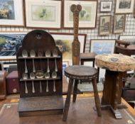 An oak spoon rack, with two pierced shelves,