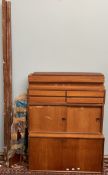 A sectional Ladderax type teak cabinet/wall unit, comprising a hinged drinks cabinet, drawers,