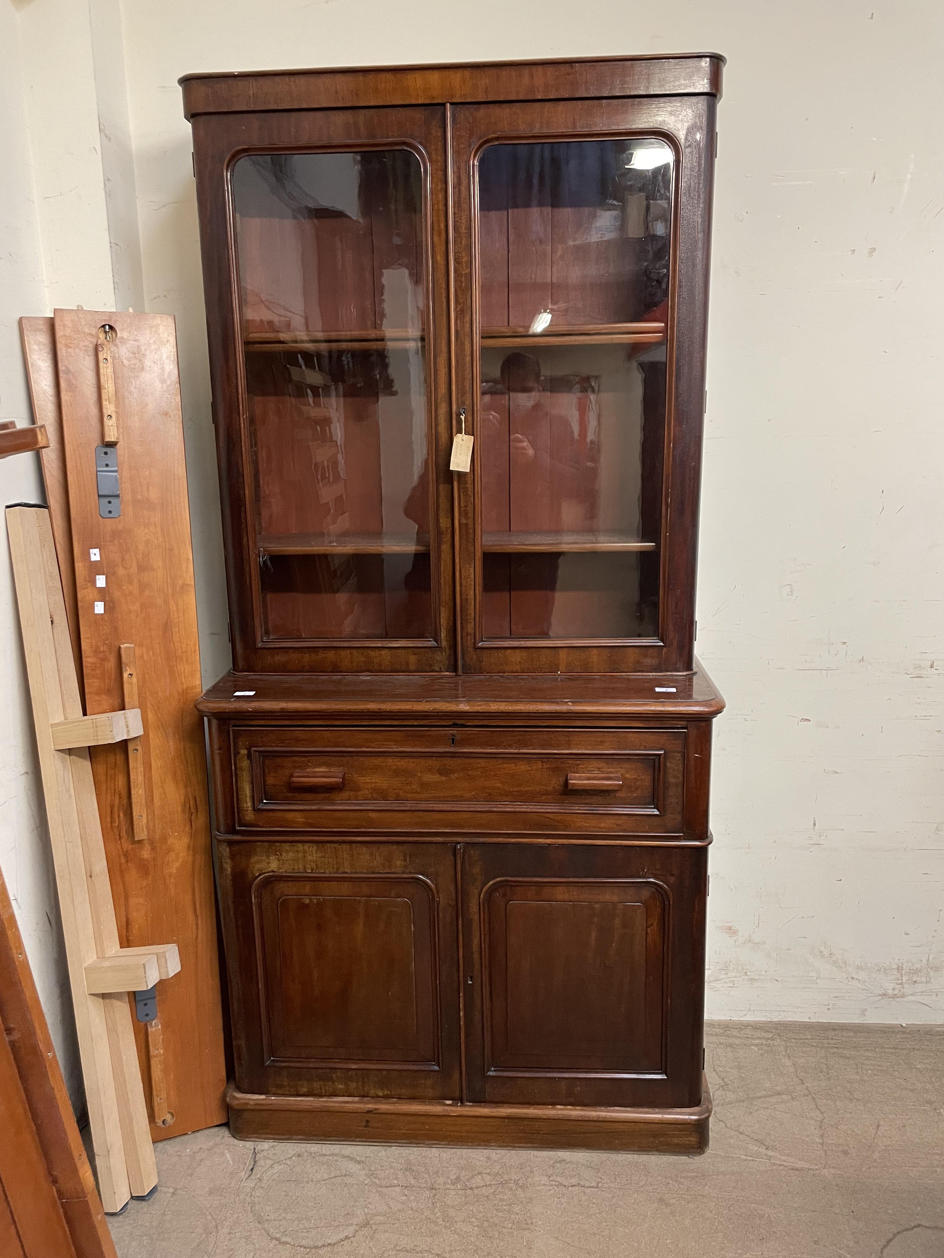 A Victorian mahogany secretaire bookcase, the cornice above a pair of glazed doors, - Bild 2 aus 3