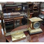 A 19th century brass mantle clock,