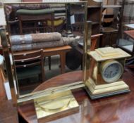 A 19th century brass mantle clock,