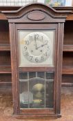 A 20th century oak wall clock,