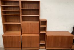 A mid 20th century Danish teak HU four piece bookcase system,
