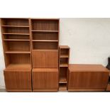 A mid 20th century Danish teak HU four piece bookcase system,