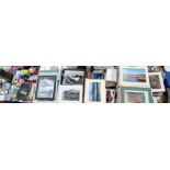 An extensive array of framed photographs,