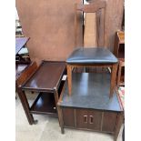 A mid 20th century teak dining chair together with a teak and ebonised side cabinet and a tea