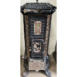 A French Godin enamelled cast iron stove with canted corners of square form