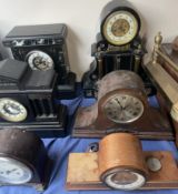 A black slate mantle clock,