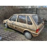 An Austin Metro Van den plas in gold, first registered August 1986, 1275cc,