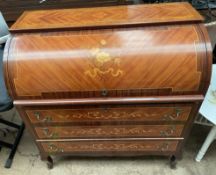 A reproduction French cylinder bureau,