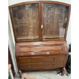 A 20th century oak bureau bookcase, with as glazed top,