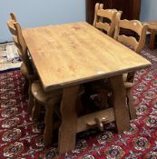 A dining table and four chairs with ladder backs