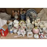 A Staffordshire cottage pastille burner together with jugs, commemorative mugs,