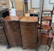 Two reproduction mahogany chests of drawers together with a small chest of drawers and a folding