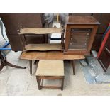 A table top collectors cabinet with a glazed door and graduated drawers together with a coffee