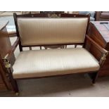 A French Empire style two seater settee,
