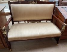 A French Empire style two seater settee,