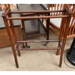 A mahogany towel rail,