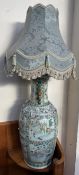 A large Cantonese porcelain vase converted to a table lamp,