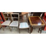 An Edwardian rosewood chair together with a pair of bedroom chairs and a nest of two tables