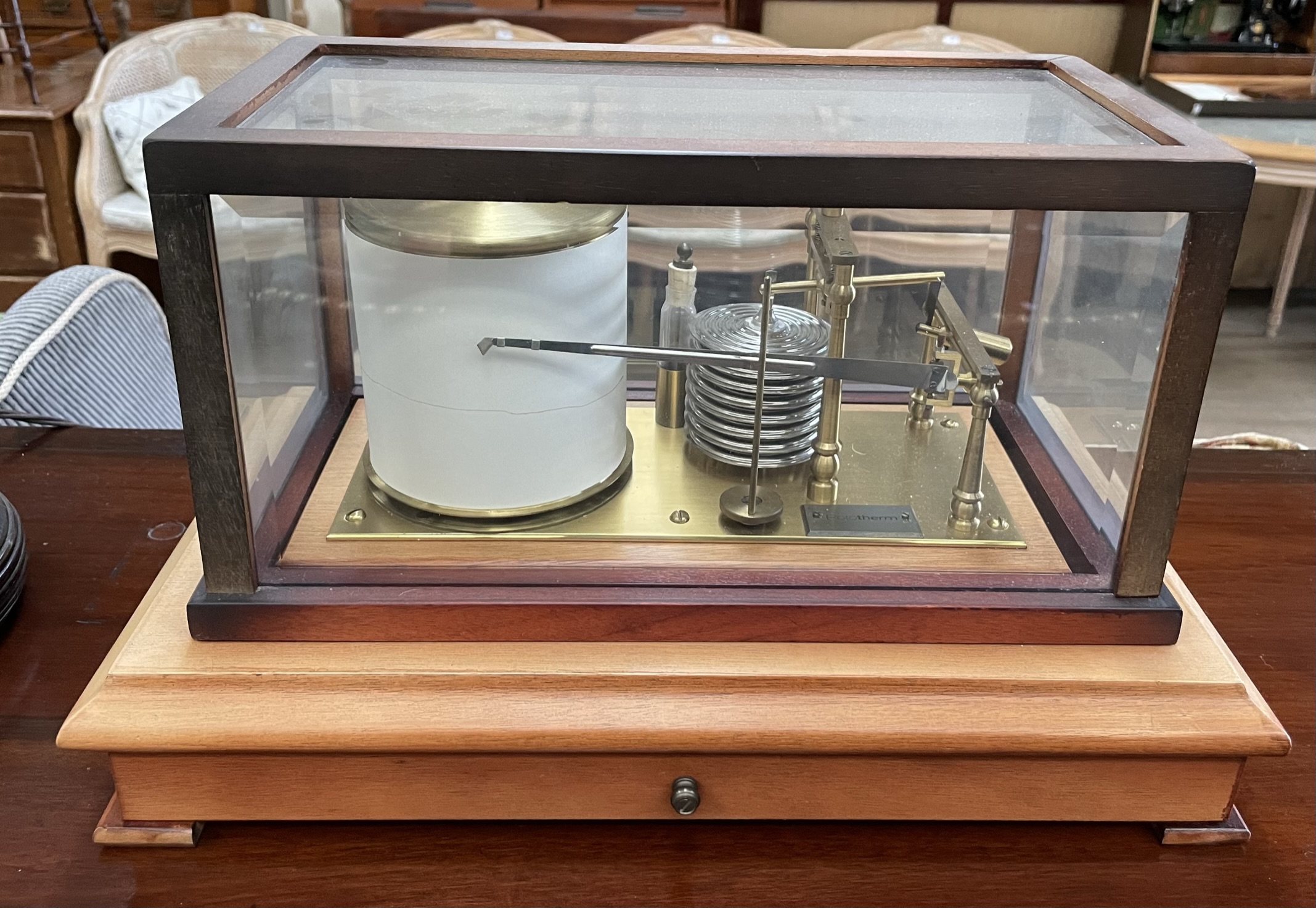 A Rototherm barograph in a glazed case with a base drawer