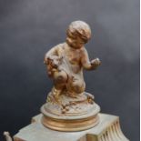 A 19th century French ormolu mantle clock, mounted with cherubs,