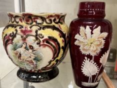 A pottery jardiniere together with a ruby glass vase