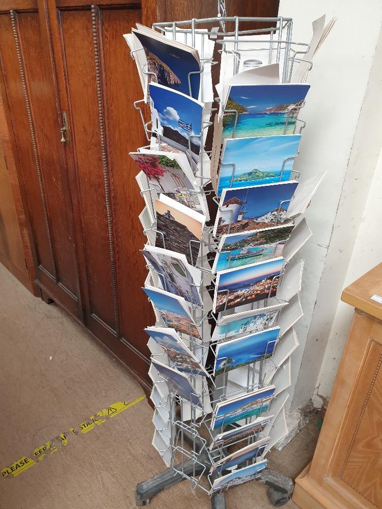 A revolving postcard stand and postcards