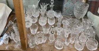 A collection of Waterford crystal drinking glasses, vases,