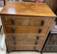 A 20th century walnut chest with four graduated drawers on cabriole legs, 76cm wide x 52.