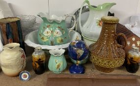 A small gem set globe together with jug and basin sets, glass bowls, RAF badges on plaques,