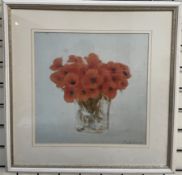 A print of a vase of poppies