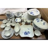A Royal Copenhagen porcelain part tea and dinner service decorated with blue flowers together with