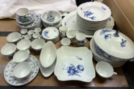 A Royal Copenhagen porcelain part tea and dinner service decorated with blue flowers together with