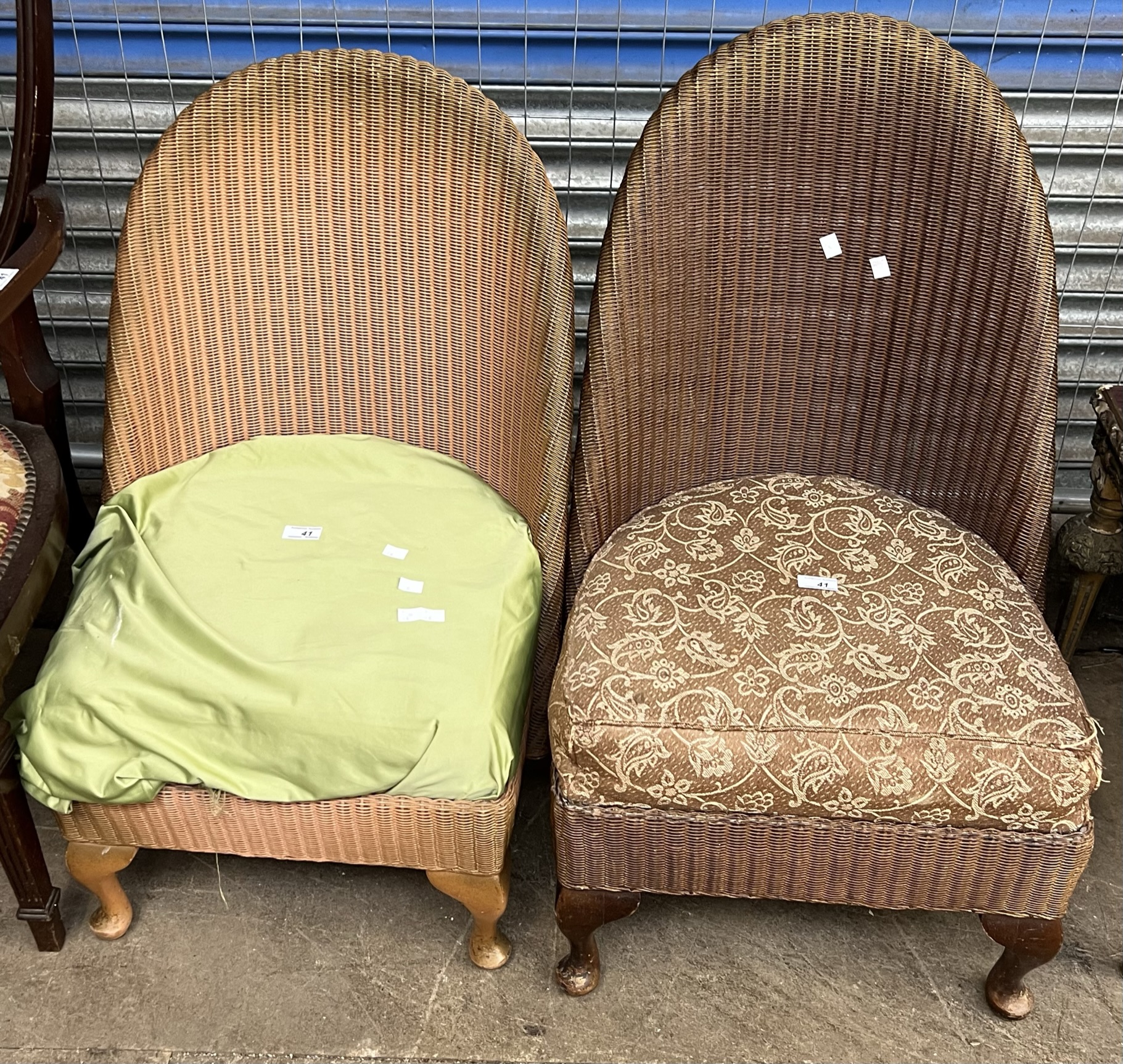 A pair of Lloyd loom nursing chairs together with three other chairs and a coffee table