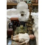 An onyx desk inkwell, together with an oil lamp with glass reservoir, treen table lamps,