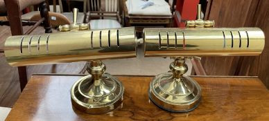 A pair of brass desk lamps