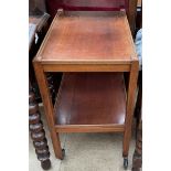 A mahogany tea trolley