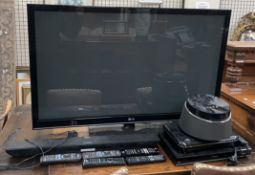 An LG 50PT353K Plasma television, together with an Hitachi sound bar, Panasonic HDD recorder,